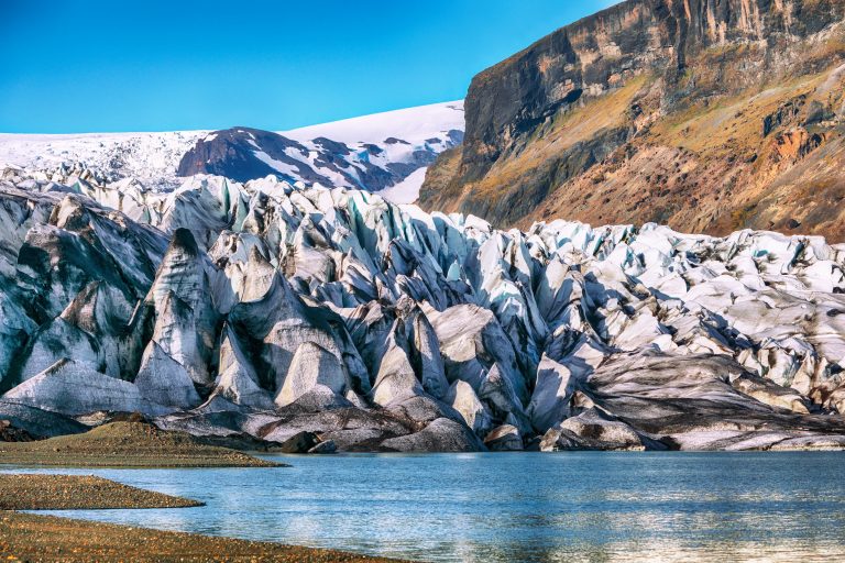 Breathtaking view of Skaftafellsjokull glacier tongue and volcanic mountains around on South Iceland. Location Skaftafell National Park, Skaftafellsjokull glacier, Iceland, Europe.