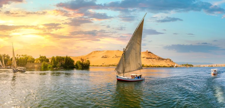 Sailboat on river Nile at sunset in Aswan, Egypt