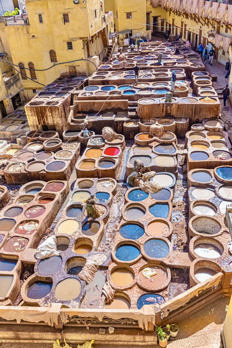 A vertical shot of the colorful tannery Fez dyeing in Morocco